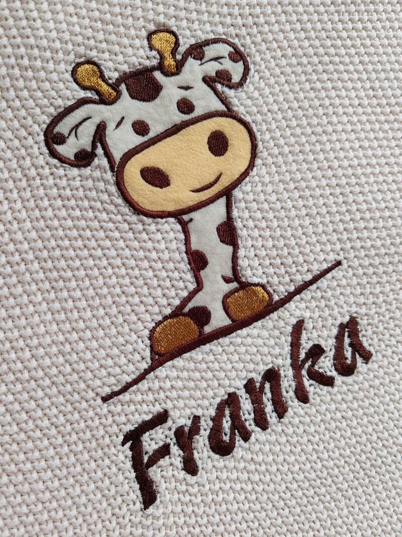 Strojni vez na pamučnoj deki